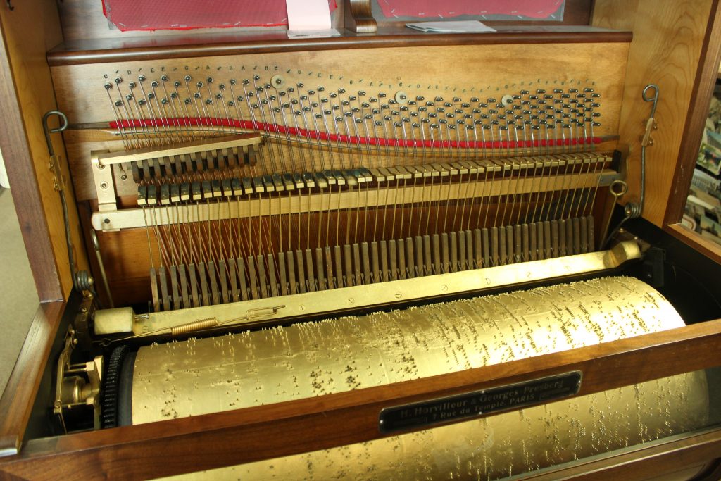 Close up of wind up player piano at Fonda Museum